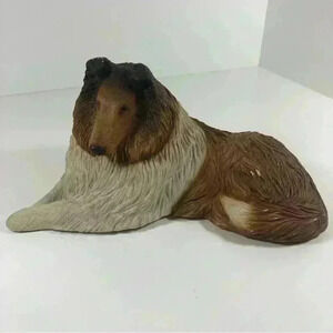 1984  Sandicast reclining collie sculpture